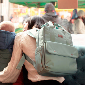 Babymel Georgi Eco baby nappy bag aqua, on mothers back,  made from recycled plastic, backpack cross shoulder nappy bag  